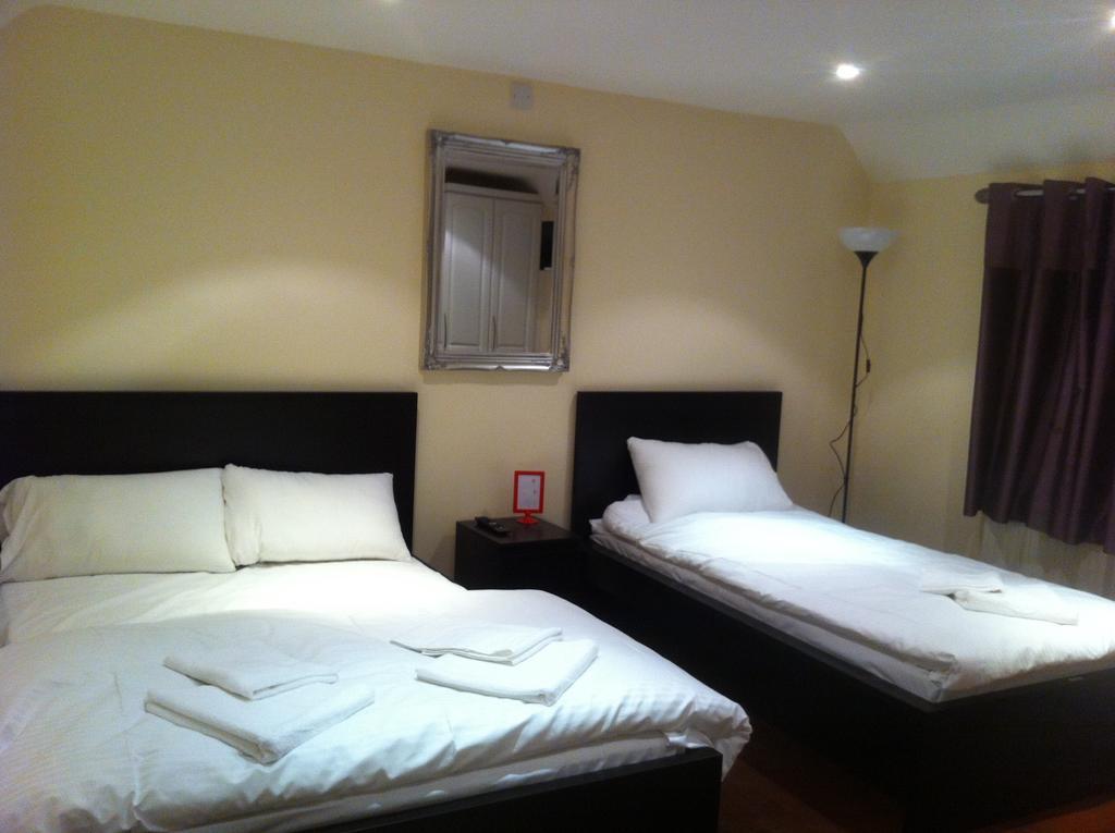 The Greyhound Cottage Chigwell Quarto foto